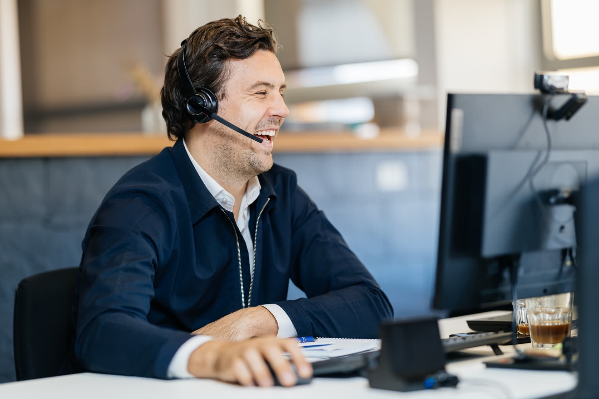 Hubexo sales colleague on a call at the Fuengirola office